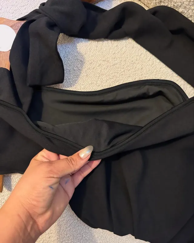 A Black One-Shoulder Halter-Neck Dress with a Bow Pleated and Fitted Short Dress Perfect for Everyday Outings and Attracting Attention a Sexy Little Black Dress for Dates — image 3