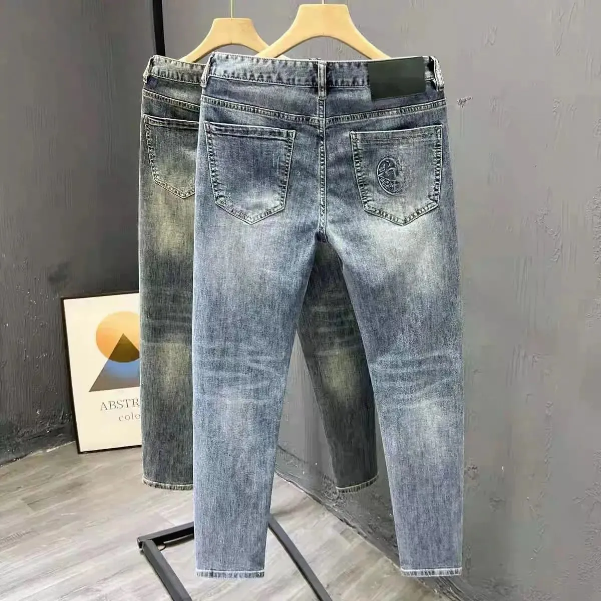 Korean Climate Lot Pants Light Luxury Trendy Brand Embossed Blue Jeans Men's Handsome Slim-fit Small Feet Elastic Trousers New — image 4