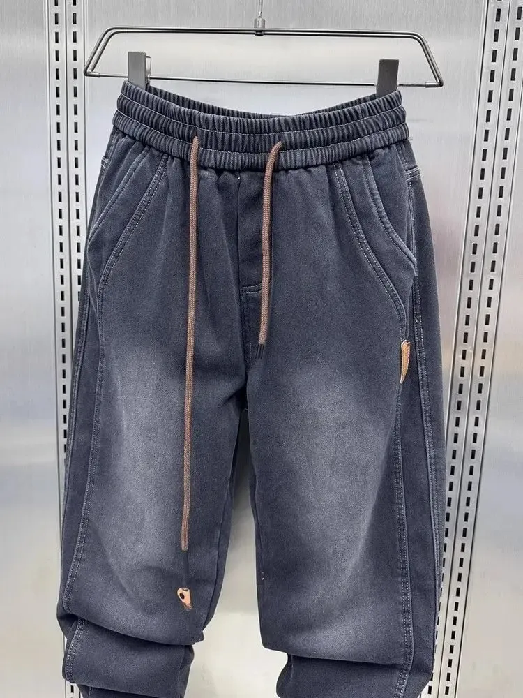 ブランド服メンズデニムトレンディなブランド洗浄ジョガージーンズ男性のための春/夏の薄いルーズローギッシュスタイリッシュだぶだぶのハーレムパンツ