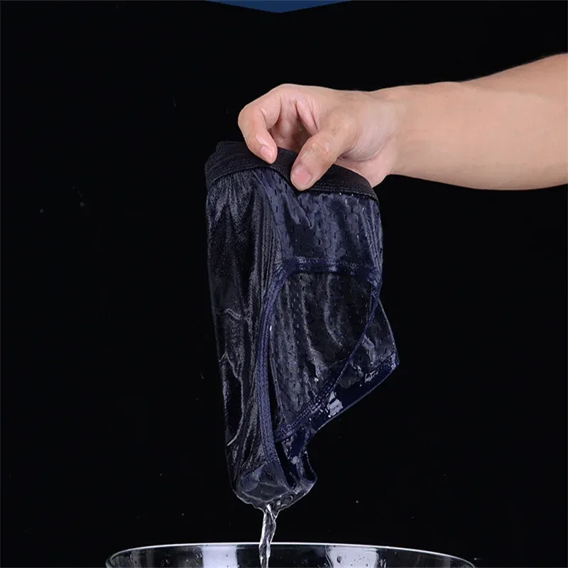 Sous-vêtements en soie glacée pour hommes, slips respirants en Fiber de carbone de bambou, antibactériens, confortables, creux, pantalons froids