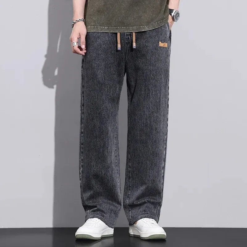 Homens azul escuro azul estiramento cintura elástica calças jeans streetwear solto calças de comprimento total em linha reta perna larga com cordão jeans — image 6