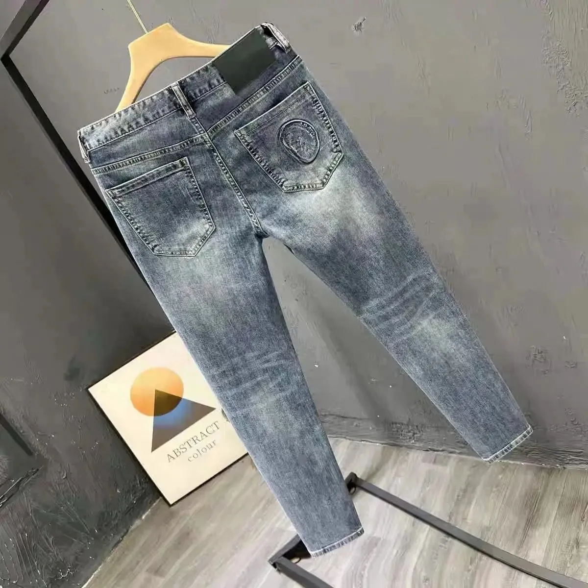 Korean Climate Lot Pants Light Luxury Trendy Brand Embossed Blue Jeans Men's Handsome Slim-fit Small Feet Elastic Trousers New — image 2