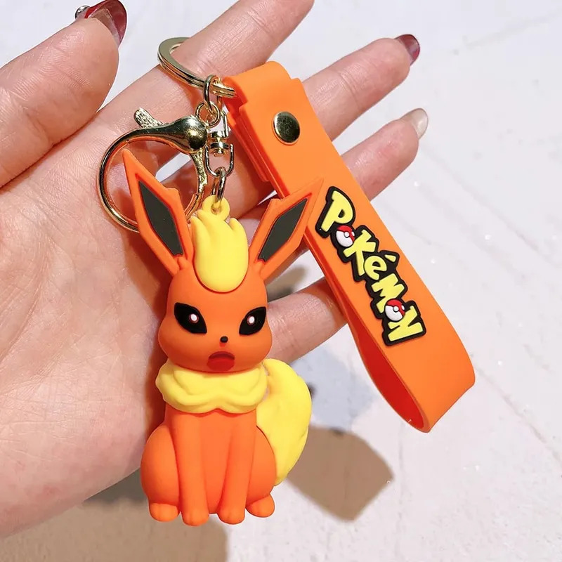 40 Style Wholesale Anime Pokémon Pikachu Eveen Keychain Cartoon Cute Charizard Keyring Student Backpack Car Key Chain Toys Gifts — image 2
