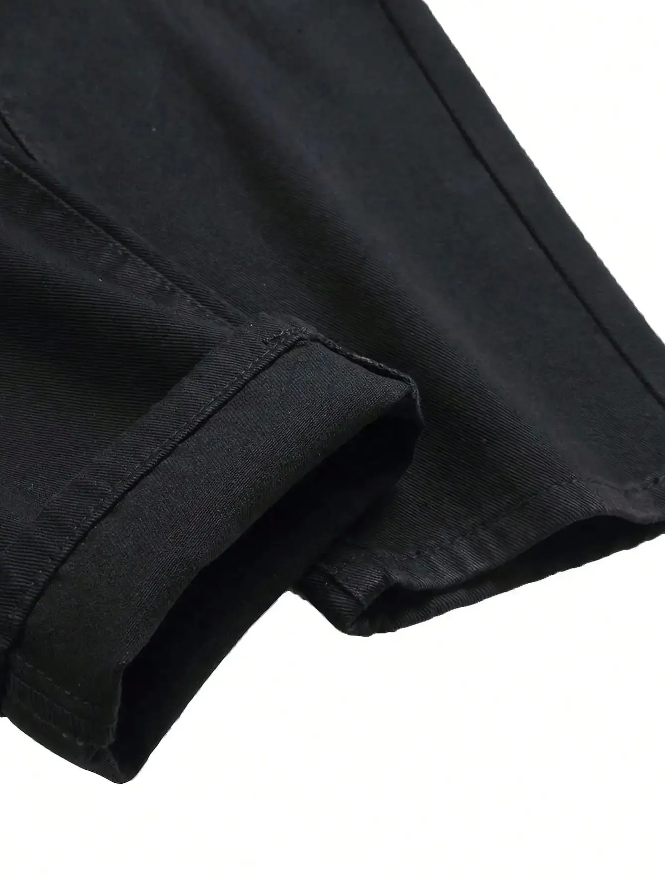 Single piece of trendy streetwear: straight-cut ripped denim jeans in black. — image 6